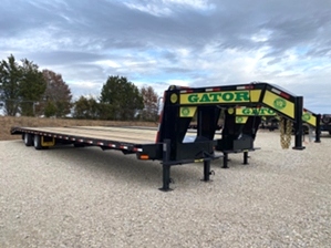 Air Ride Gooseneck Trailer 72in Spread Axle  Air Ride Gooseneck Trailer 72in Spread Axle. Spread axles with toolbox storage and Gator tuff ramps 